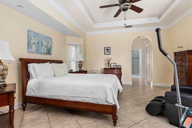 18652 Ohara Dr, Port Charlotte, FL 33948 - bedroom featuring a tray ceiling, arched walkways, light tile patterned flooring, visible vents, and crown molding