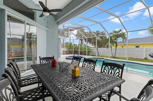 18652 Ohara Dr, Port Charlotte, FL 33948 - view of patio with a lanai, a jacuzzi, a fenced in pool, and ceiling fan