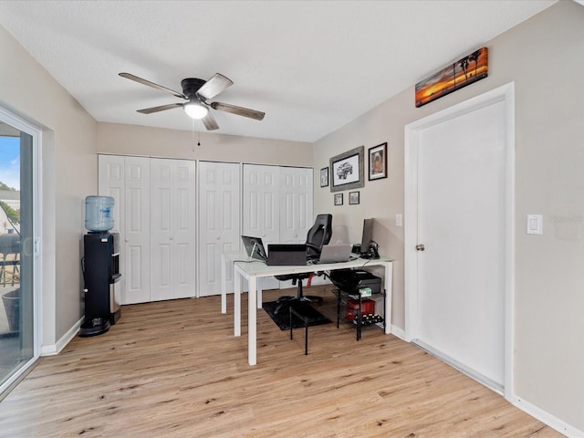 6531 Marius Rd, North Port, FL 34287 - office area with a ceiling fan, baseboards, and light wood-style flooring
