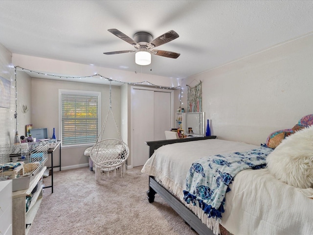 6531 Marius Rd, North Port, FL 34287 - carpeted bedroom with baseboards, a ceiling fan, and a closet