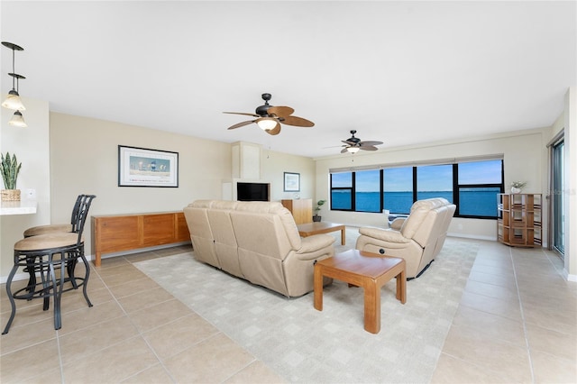 1750 Jamaica Way Unit 312, Punta Gorda, FL 33950 - living area featuring ceiling fan, baseboards, and light tile patterned floors