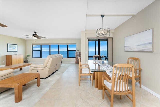 1750 Jamaica Way Unit 312, Punta Gorda, FL 33950 - dining space featuring light tile patterned flooring, baseboards, and ceiling fan with notable chandelier