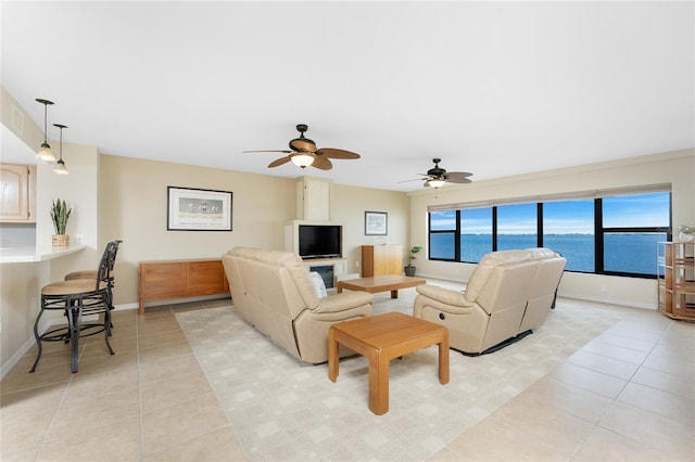 1750 Jamaica Way Unit 312, Punta Gorda, FL 33950 - living room featuring baseboards, ceiling fan, and light tile patterned flooring