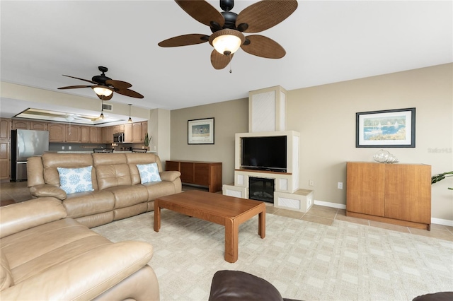 1750 Jamaica Way Unit 312, Punta Gorda, FL 33950 - living room with light tile patterned floors, baseboards, and ceiling fan