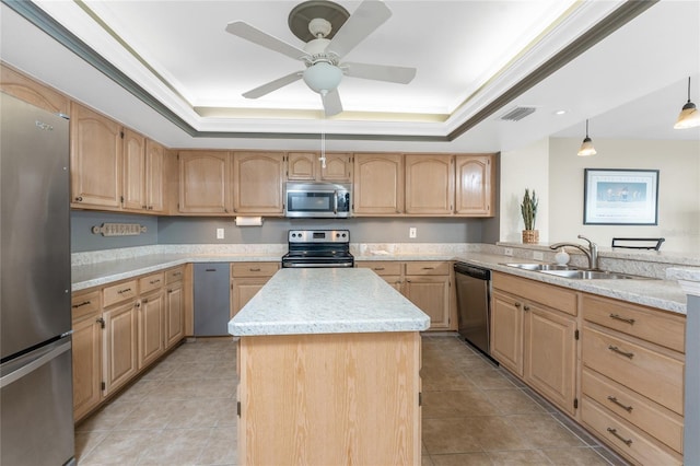 1750 Jamaica Way Unit 312, Punta Gorda, FL 33950 - kitchen featuring stainless steel appliances, light brown cabinetry, a sink, a tray ceiling, and visible vents