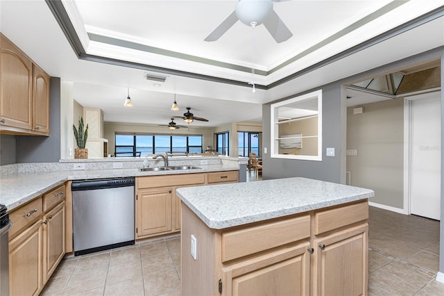 1750 Jamaica Way Unit 312, Punta Gorda, FL 33950 - kitchen featuring stainless steel dishwasher, light brown cabinetry, a sink, ceiling fan, and a raised ceiling