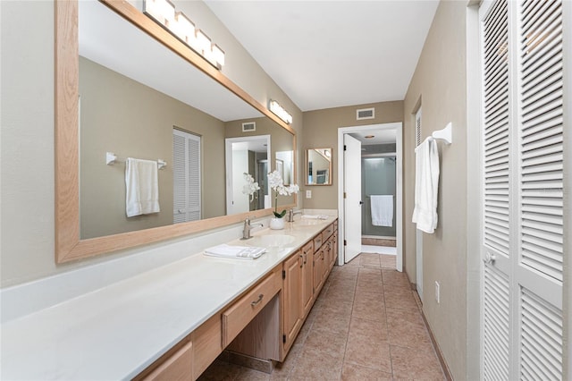 1750 Jamaica Way Unit 312, Punta Gorda, FL 33950 - full bath with visible vents, a sink, and a closet