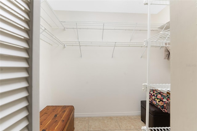 1750 Jamaica Way Unit 312, Punta Gorda, FL 33950 - walk in closet featuring light tile patterned floors