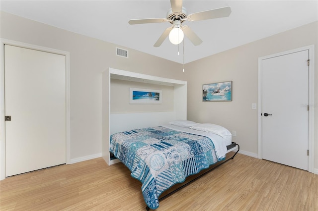 1750 Jamaica Way Unit 312, Punta Gorda, FL 33950 - bedroom featuring visible vents, light wood finished floors, baseboards, and ceiling fan