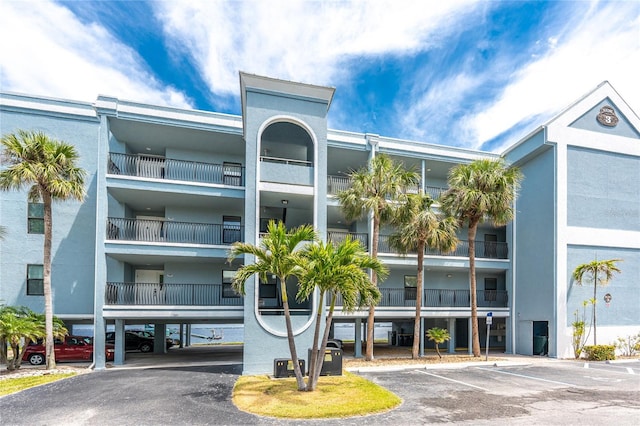 1750 Jamaica Way Unit 312, Punta Gorda, FL 33950 - view of property featuring uncovered parking