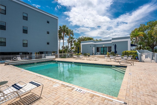 1750 Jamaica Way Unit 312, Punta Gorda, FL 33950 - pool with fence, french doors, and a patio