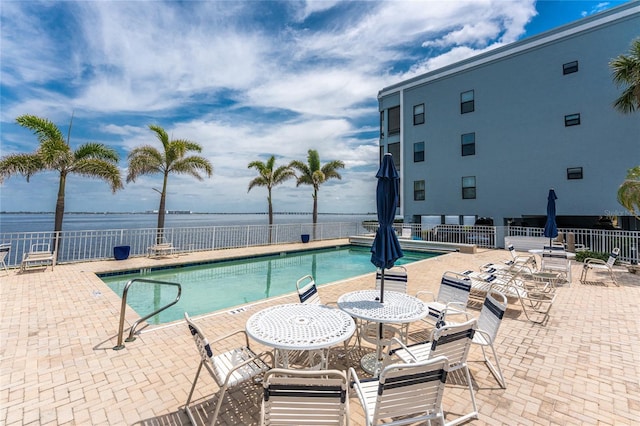 1750 Jamaica Way Unit 312, Punta Gorda, FL 33950 - community pool with fence, a water view, and a patio area