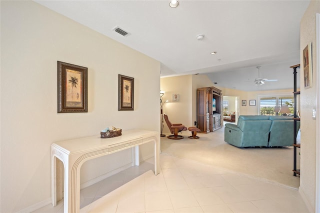 corridor featuring recessed lighting and visible vents