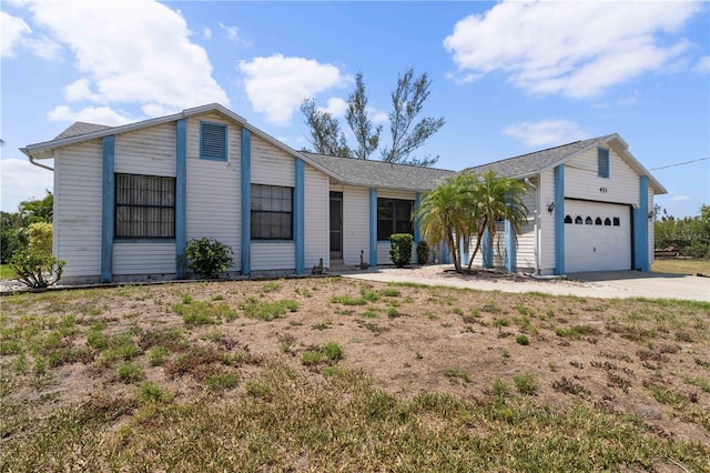 453 Carolyn Ln, Punta Gorda, FL 33950 - ranch-style house with a garage and concrete driveway