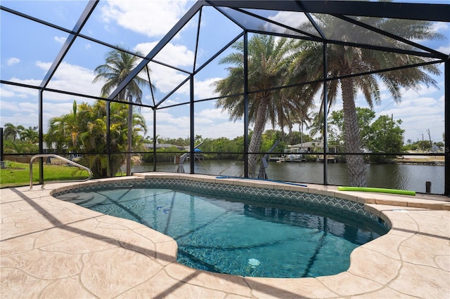 453 Carolyn Ln, Punta Gorda, FL 33950 - pool featuring glass enclosure, a water view, and a patio area