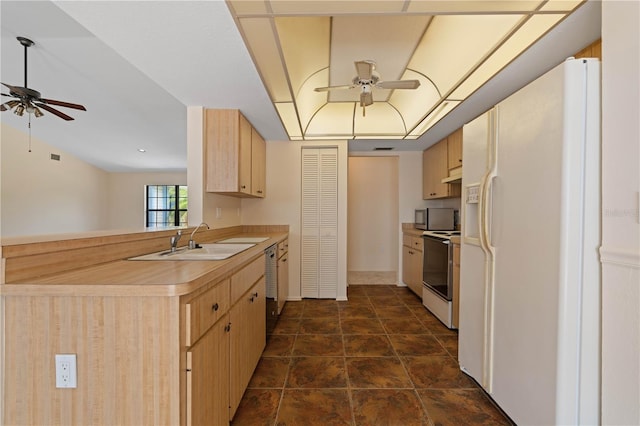 453 Carolyn Ln, Punta Gorda, FL 33950 - kitchen with white fridge with ice dispenser, stainless steel microwave, a ceiling fan, and electric stove