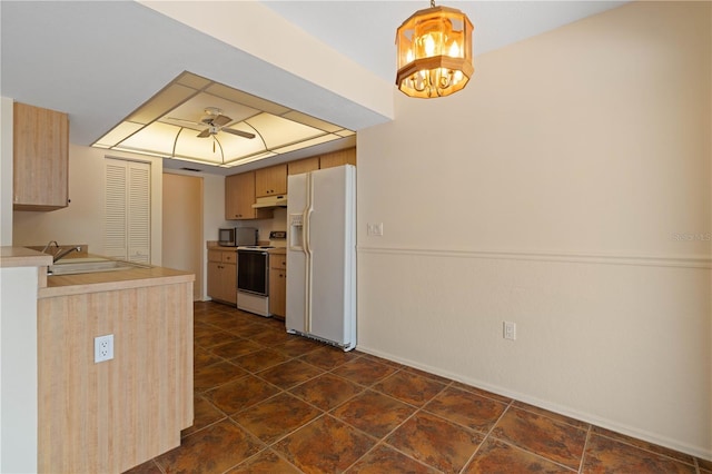 453 Carolyn Ln, Punta Gorda, FL 33950 - kitchen featuring white refrigerator with ice dispenser, a sink, stainless steel microwave, electric stove, and under cabinet range hood