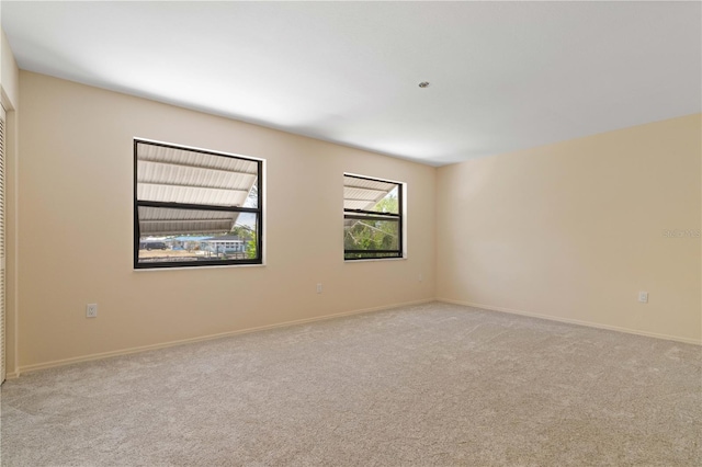 453 Carolyn Ln, Punta Gorda, FL 33950 - empty room featuring carpet flooring and baseboards