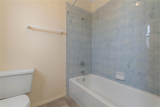 453 Carolyn Ln, Punta Gorda, FL 33950 - bathroom with toilet, tile patterned floors, bathing tub / shower combination, and baseboards