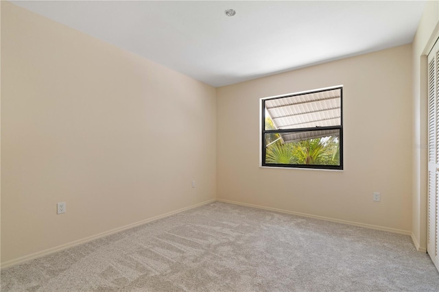 453 Carolyn Ln, Punta Gorda, FL 33950 - spare room with carpet flooring and baseboards