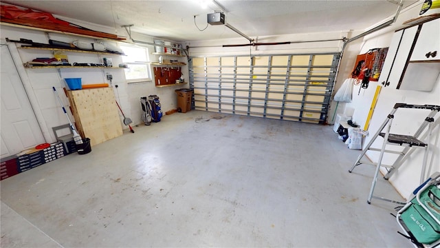 garage featuring a garage door opener