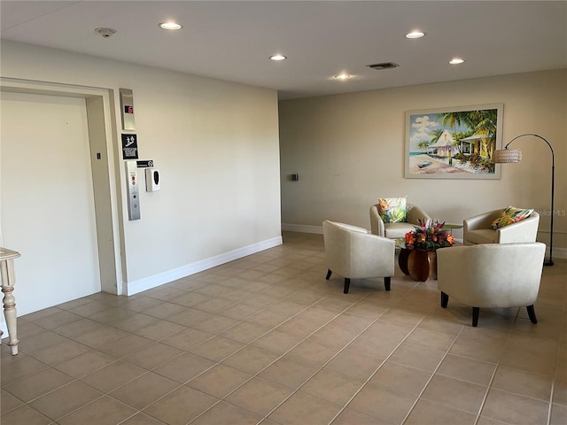 25188 Marion Ave Unit F304, Punta Gorda, FL 33950 - living area with light tile patterned flooring, visible vents, recessed lighting, and baseboards