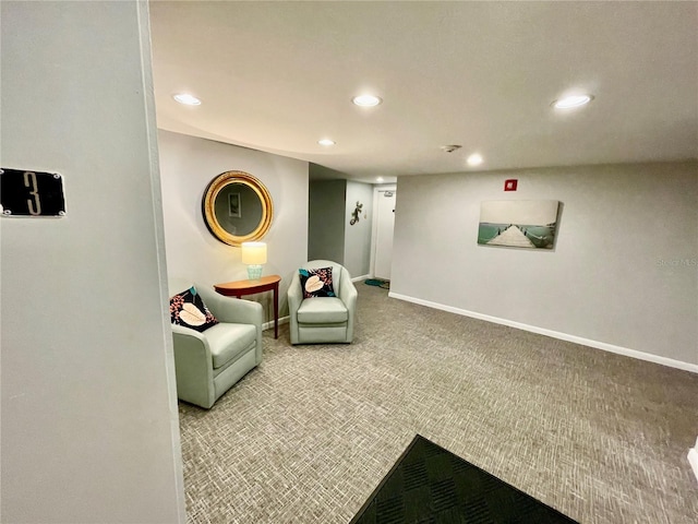 25188 Marion Ave Unit F304, Punta Gorda, FL 33950 - living area featuring baseboards, recessed lighting, and carpet flooring