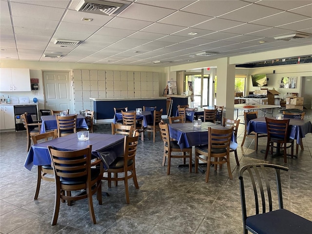 25188 Marion Ave Unit F304, Punta Gorda, FL 33950 - dining space with a drop ceiling and visible vents