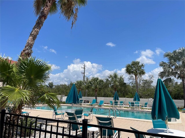 25188 Marion Ave Unit F304, Punta Gorda, FL 33950 - pool with fence and a patio area