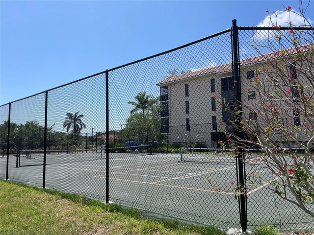 25188 Marion Ave Unit F304, Punta Gorda, FL 33950 - view of sport court with fence