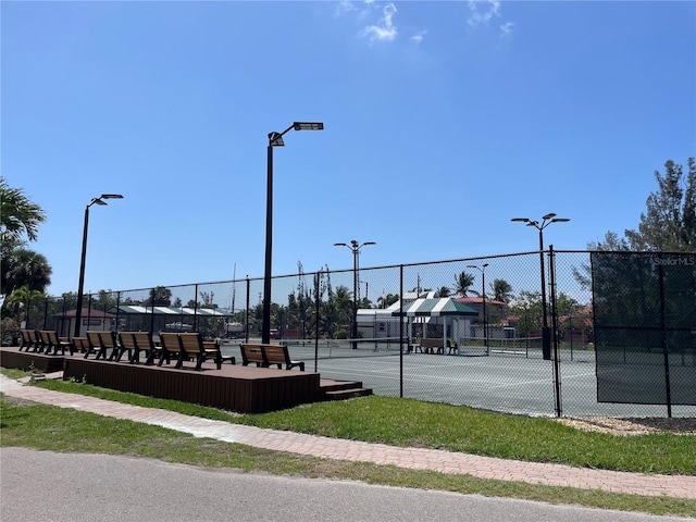 25188 Marion Ave Unit F304, Punta Gorda, FL 33950 - view of tennis court with fence