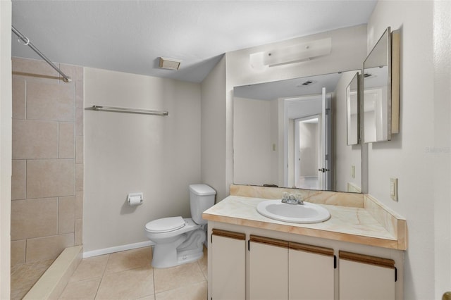 19505 Quesada Ave Unit A204, Port Charlotte, FL 33948 - bathroom featuring a tile shower, visible vents, toilet, tile patterned floors, and vanity