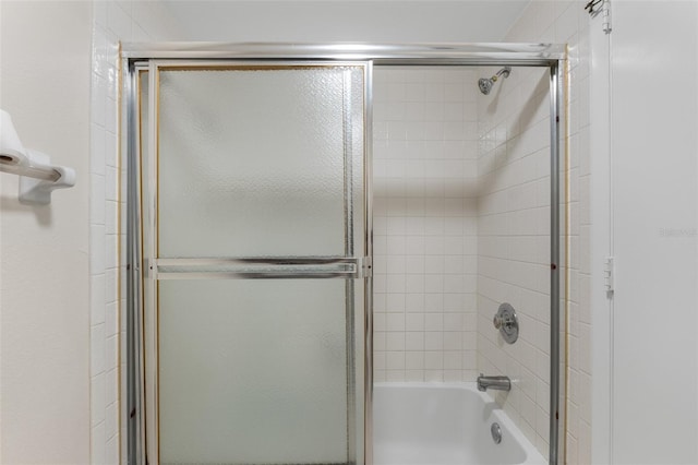 19505 Quesada Ave Unit A204, Port Charlotte, FL 33948 - bathroom featuring combined bath / shower with glass door