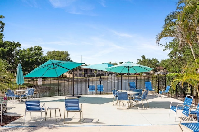 19505 Quesada Ave Unit A204, Port Charlotte, FL 33948 - exterior space featuring a patio and fence
