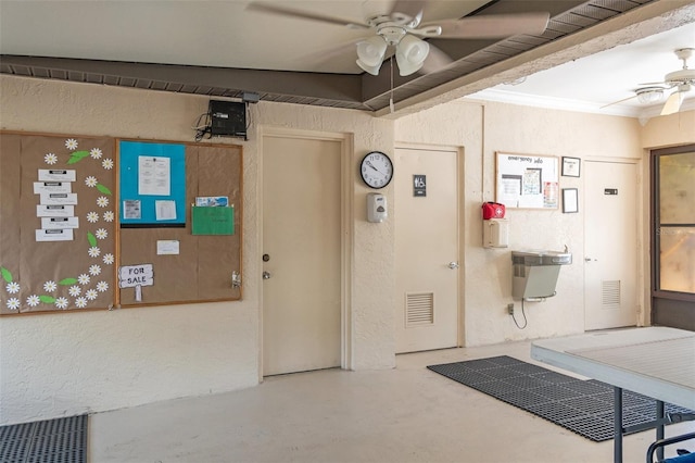 19505 Quesada Ave Unit A204, Port Charlotte, FL 33948 - interior space featuring finished concrete flooring, ceiling fan, visible vents, and a textured wall