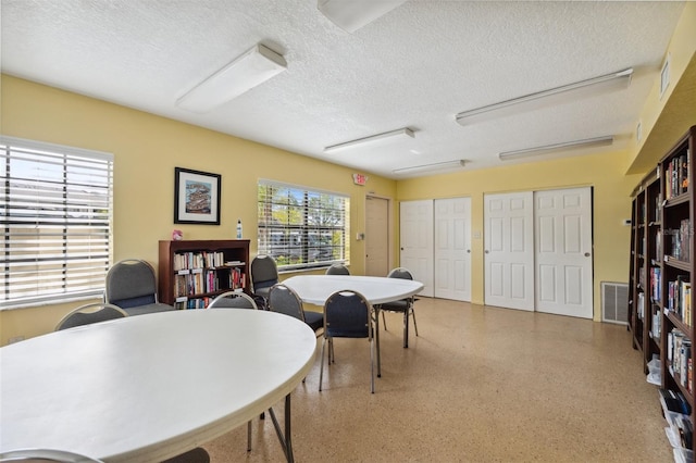 19505 Quesada Ave Unit A204, Port Charlotte, FL 33948 - office space with a textured ceiling, visible vents, and speckled floor