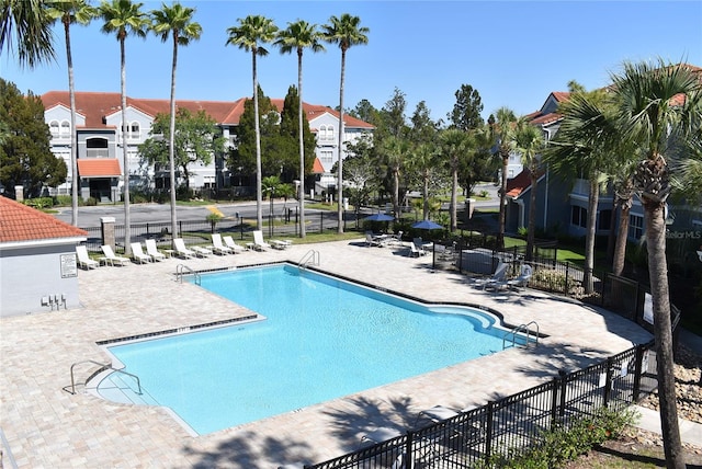 18001 Richmond Place Dr Unit 636, Tampa, FL 33647 - community pool with a residential view, fence, and a patio area