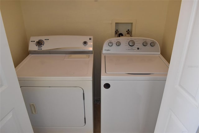 18001 Richmond Place Dr Unit 636, Tampa, FL 33647 - laundry room featuring separate washer and dryer and laundry area