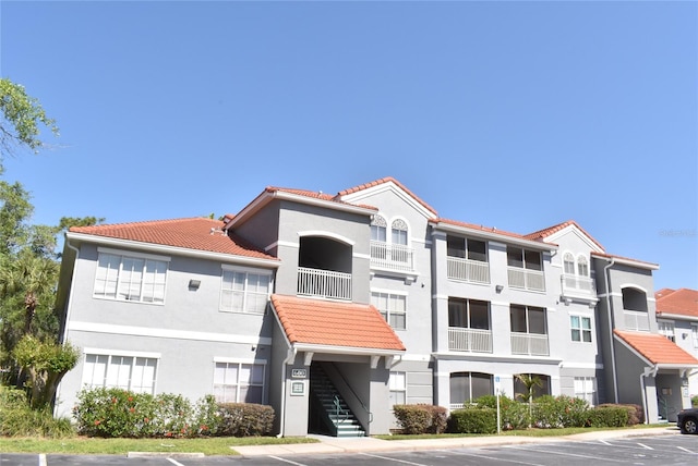 18001 Richmond Place Dr Unit 636, Tampa, FL 33647 - view of building exterior featuring uncovered parking
