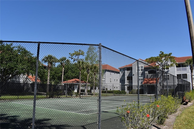18001 Richmond Place Dr Unit 636, Tampa, FL 33647 - view of sport court featuring fence