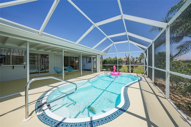 48 Hibiscus Dr, Punta Gorda, FL 33950 - outdoor pool featuring a patio area and glass enclosure
