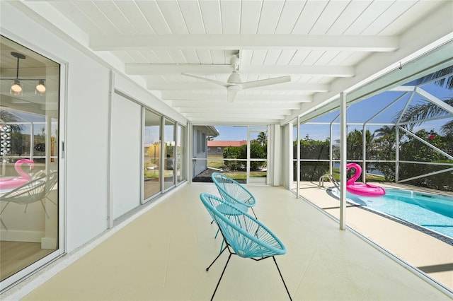 48 Hibiscus Dr, Punta Gorda, FL 33950 - unfurnished sunroom featuring beamed ceiling, ceiling fan, and a swimming pool