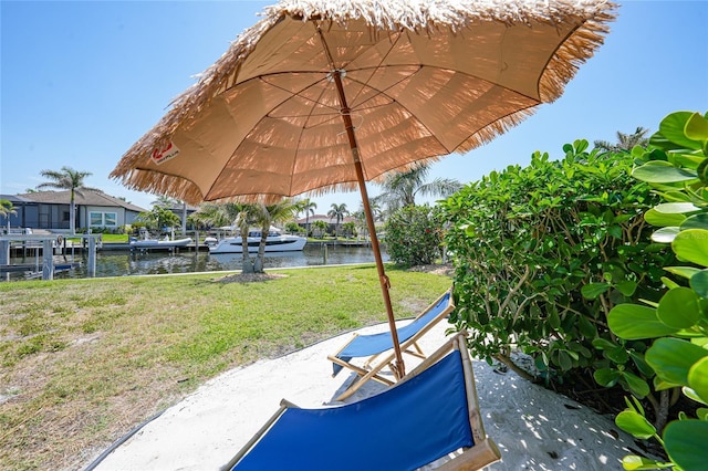 48 Hibiscus Dr, Punta Gorda, FL 33950 - view of patio / terrace with a water view