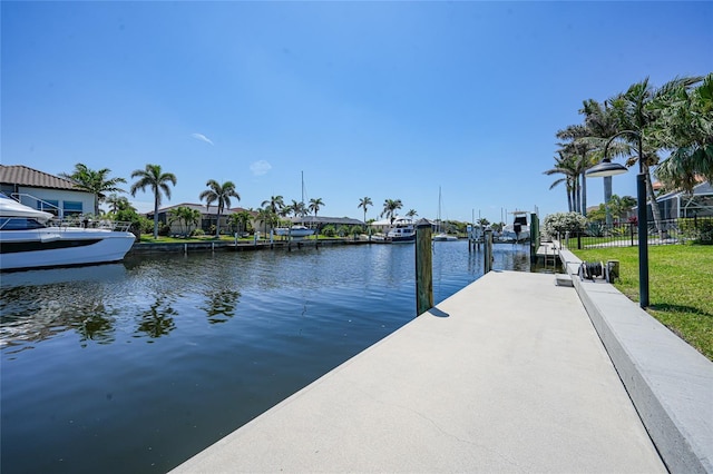 48 Hibiscus Dr, Punta Gorda, FL 33950 - dock area featuring fence, a residential view, and a water view