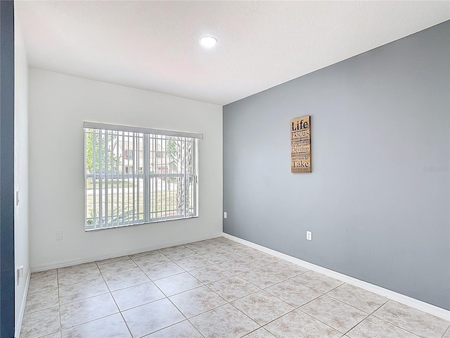3514 Yacht Club Ct, Kissimmee, FL 34746 - unfurnished room with light tile patterned flooring, recessed lighting, and baseboards