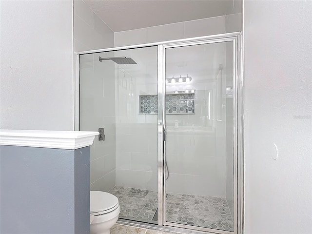 3514 Yacht Club Ct, Kissimmee, FL 34746 - bathroom featuring toilet and a shower stall