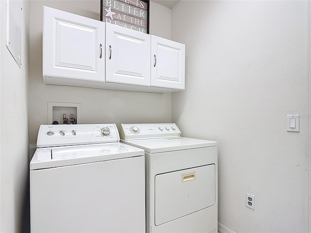 3514 Yacht Club Ct, Kissimmee, FL 34746 - laundry room featuring cabinet space and separate washer and dryer