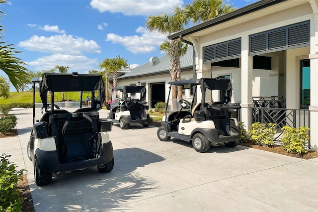 view of car parking featuring driveway