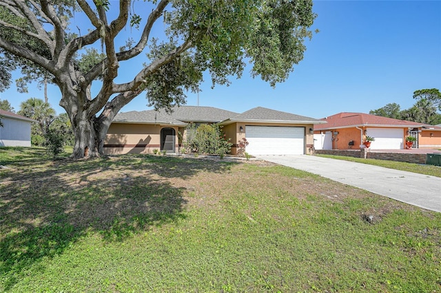 2751 S Cranberry Blvd, North Port, FL 34286 - single story home with an attached garage, driveway, a front lawn, and stucco siding