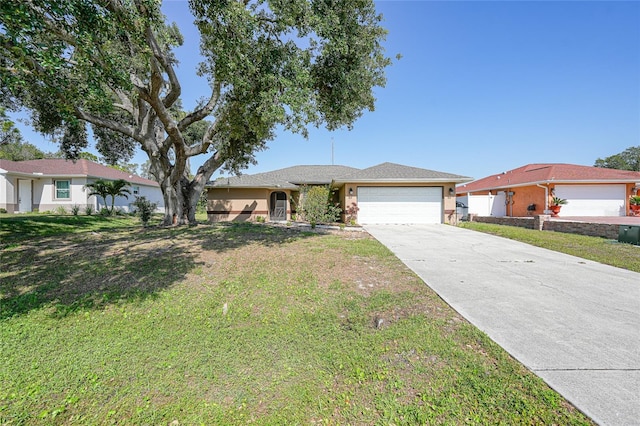 2751 S Cranberry Blvd, North Port, FL 34286 - single story home with a garage, driveway, a front lawn, and stucco siding